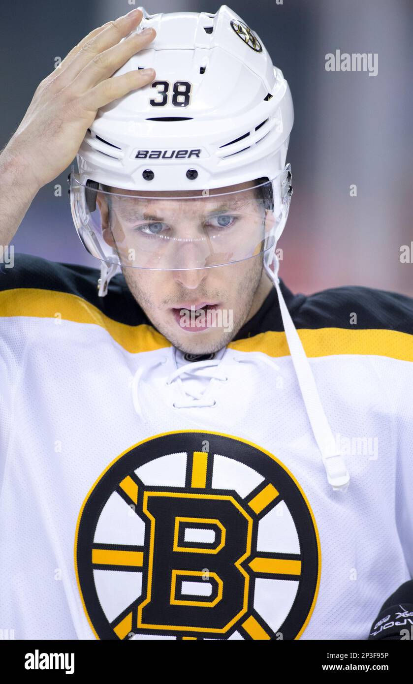 NHL profile photo on Boston Bruins' Jordan Caron during a game against the  Calgary Flames in Calgary, Alberta on Feb. 16, 2015. (AP Photo/Larry  MacDougal Stock Photo - Alamy