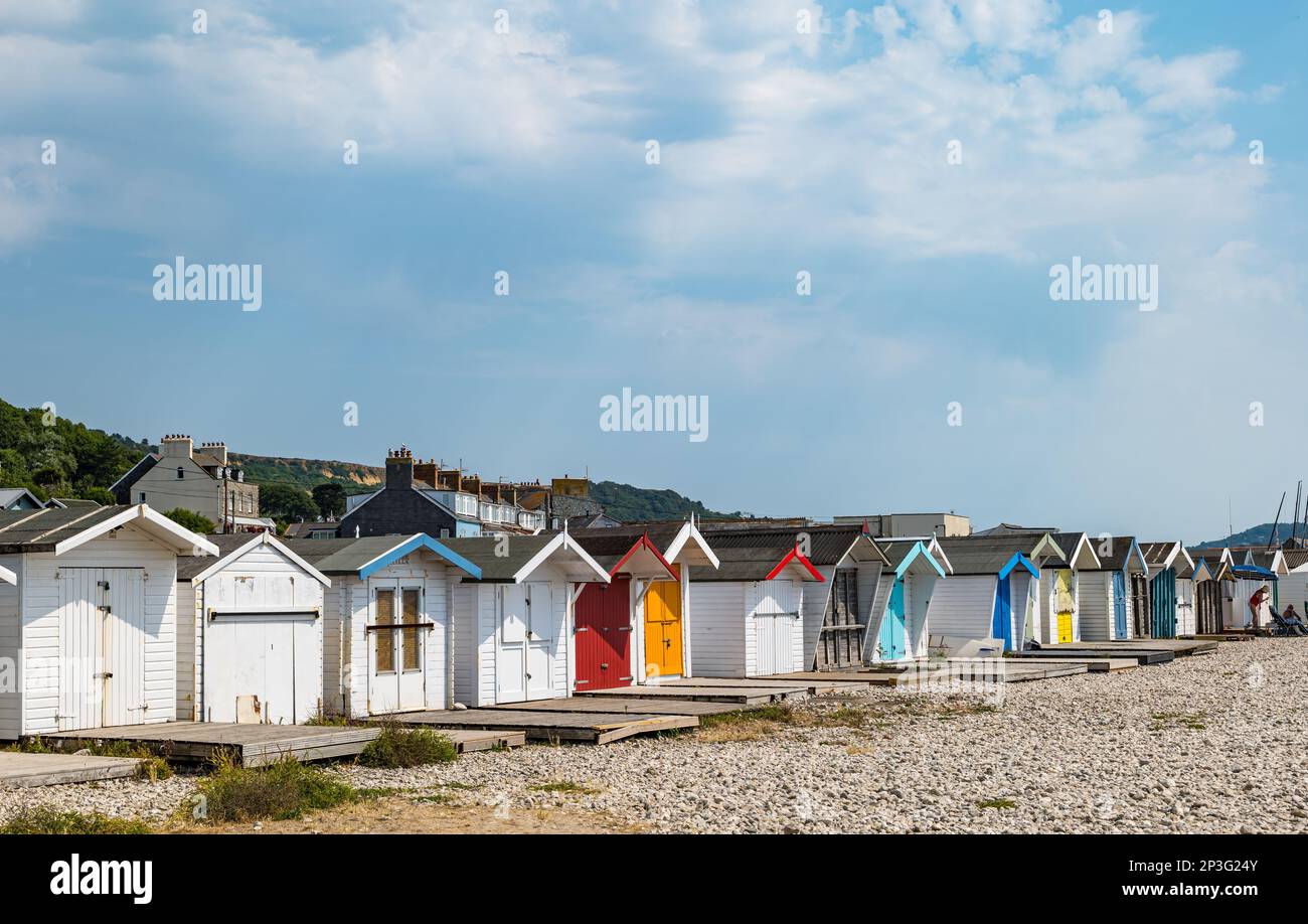 Row of beach huts at  Monmouth beach, Lyme Regis, Dorset, England, UK Stock Photo