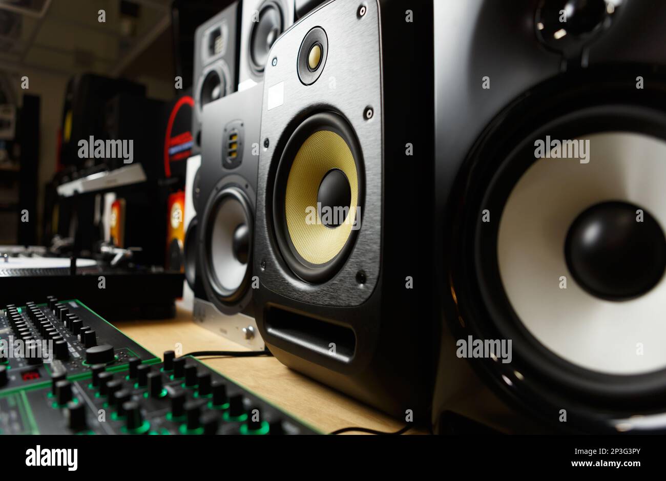 New speakers in music store. Buy professional studio monitors for sound recording. High fidelity