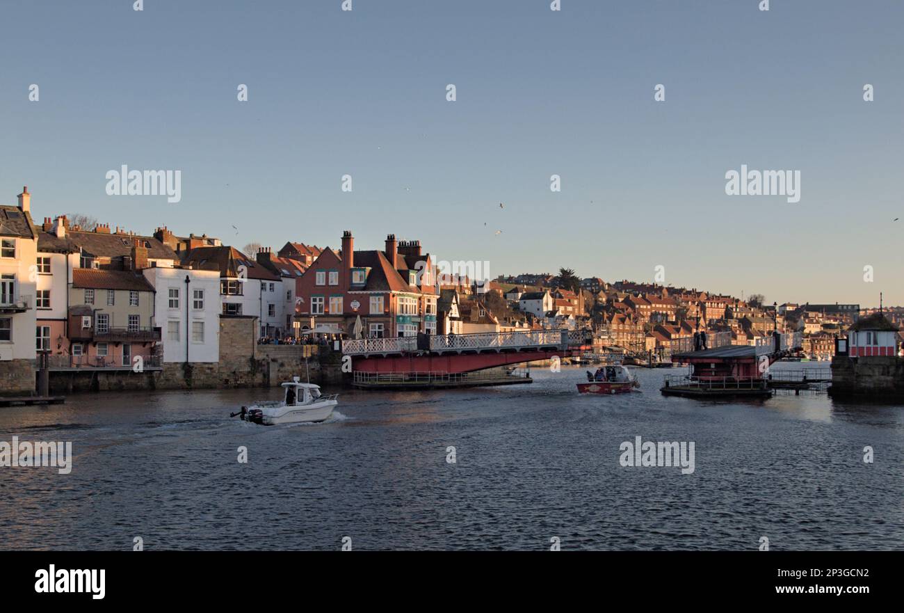 Old harbour swing bridge opening at Whitby, North Yorkshire Stock Photo
