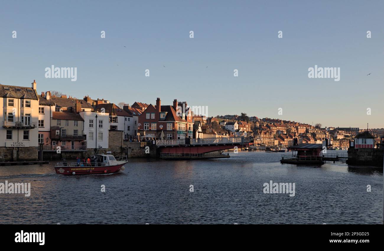Old harbour swing bridge opening at Whitby, North Yorkshire Stock Photo