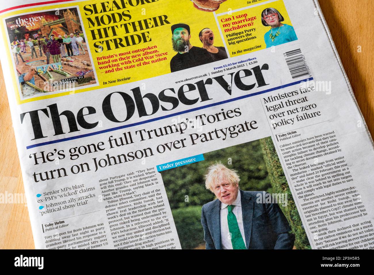 5 March 2023. Observer headline reads 'He's gone full Trump': Tories turn on Johnson over Partygate'. Stock Photo