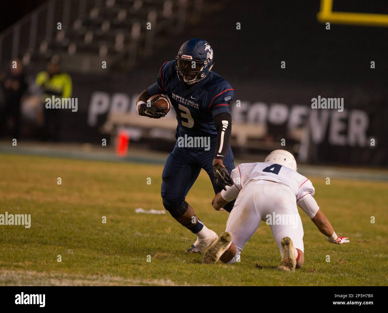 https://c8.alamy.com/comp/2P3H7BX/january-4-2015-carson-caeast-coast-blue-team-and-michigan-state-spartans-verbal-commit-running-back-3-larry-scott-tries-to-break-free-of-a-tackle-attempt-during-the-4th-annual-semper-fidelis-all-american-bowl-football-game-between-the-blue-team-from-the-east-coast-and-the-white-team-from-the-west-coast-at-the-stubhub-center-in-carson-california-the-east-coast-blue-team-defeated-the-west-coast-white-team-24-3-mandatory-credit-juan-lainez-marinmedia-cal-sport-media-cal-sport-media-via-ap-images-2P3H7BX.jpg