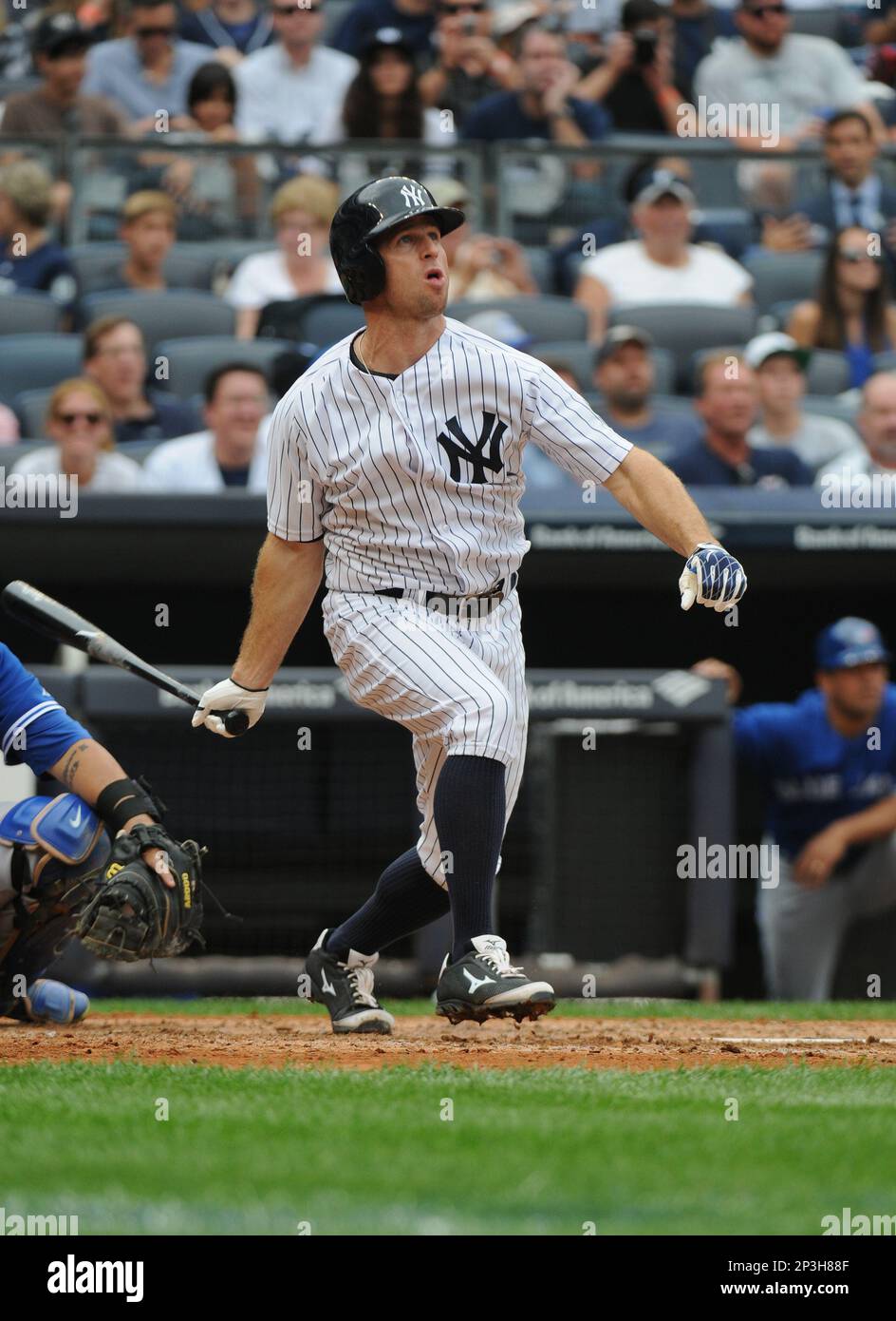 New York Yankees outfielder Brett Gardner (11) hits a homerun during