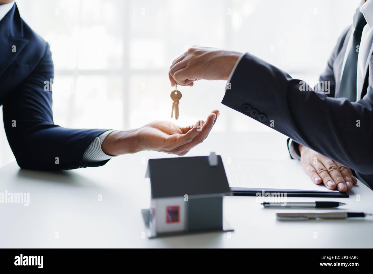 Real estate company to buy houses and land are delivering keys and