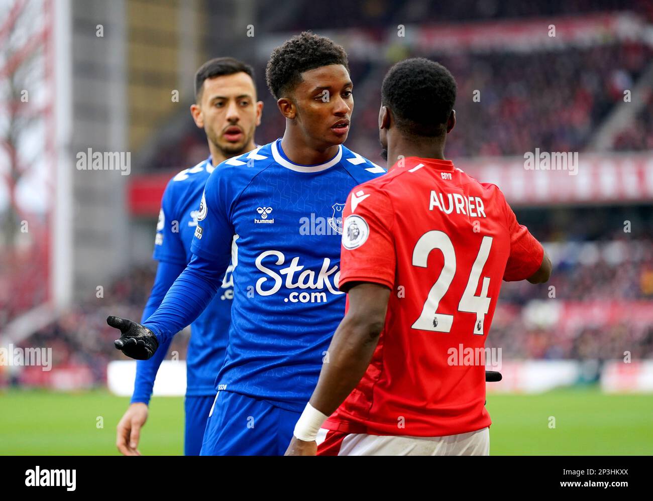 Everton's Demarai Gray (left) and Nottingham Forest's Serge Aurier exchange words during the Premier League match at the City Ground, Nottingham. Picture date: Sunday March 5, 2023. Stock Photo