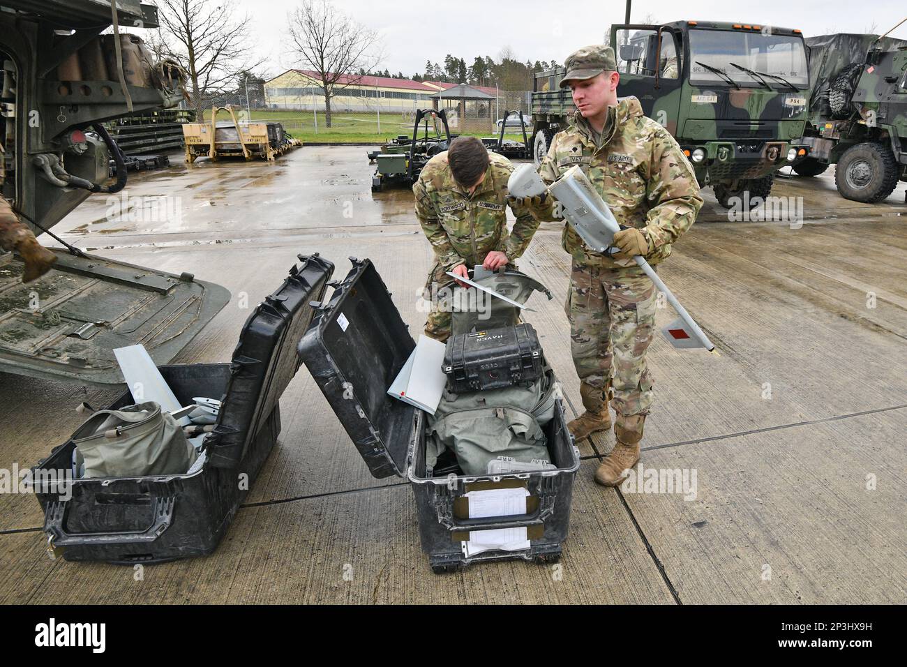 U.S. Soldiers with Palehorse Troop, 4th Squadron, 2nd Cavalry Regiment assemble an RQ-11 Raven, a Small Unmanned Aircraft System, ahead of a training exercise on Rose Barracks, Vilseck, Germany, Jan. 10, 2023. 2CR provides V Corps with a lethal and agile force capable of rapid deployment throughout the European theater in order to assure allies, deter adversaries, and when ordered, defend the NATO alliance. Stock Photo