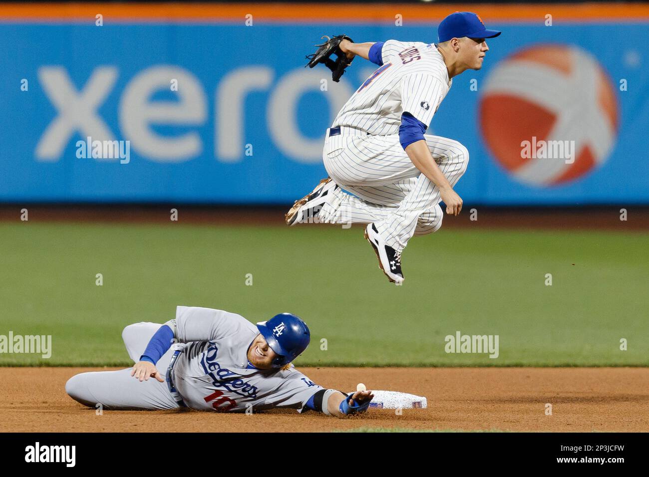 May 22, 2014: New York Mets Infield Wilmer Flores (4) [5870] leaps