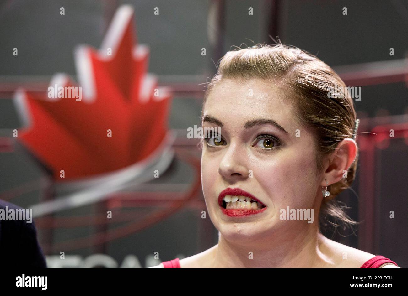 Canada's Alaine Chartrand reacts as he marks are posted for her short