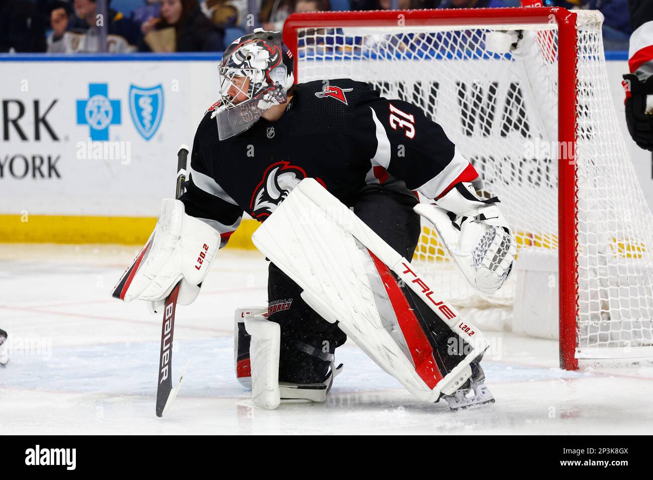 Buffalo Sabres goaltender Eric Comrie (31) looks on during the second ...