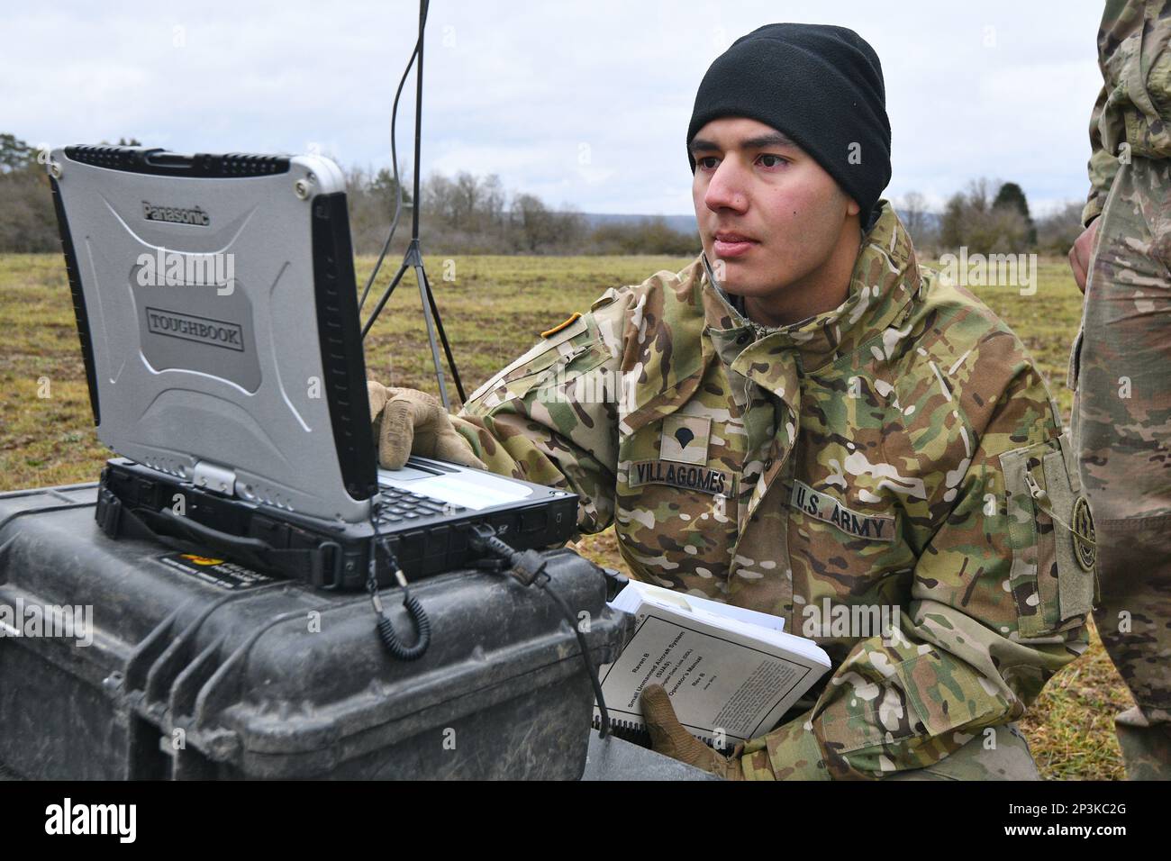 U.S. Army Spc. Diego Villagomes with Palehorse Troop, 4th Squadron, 2nd Cavalry Regiment operates a monitor during a training exercise with an RQ-11 Raven, a Small Unmanned Aircraft System, at the 7th Army Training Command’s Grafenwoehr Training Area, Germany, Jan. 10, 2023. 2CR provides V Corps with a lethal and agile force capable of rapid deployment throughout the European theater in order to assure allies, deter adversaries, and when ordered, defend the NATO alliance. Stock Photo