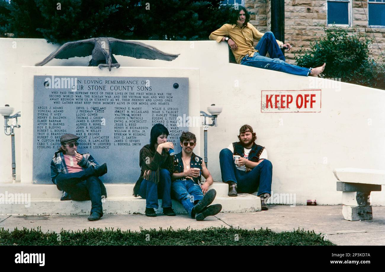 People at the Stone County war memorial in Mountain View, Arkansas