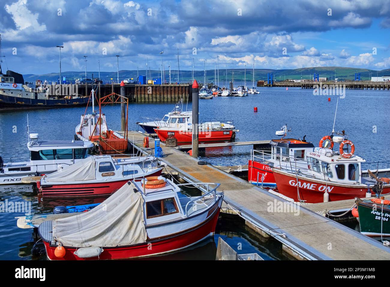 Small boats in Stranraer harbour, Dumfries and Galloway, Scotland. Stock Photo