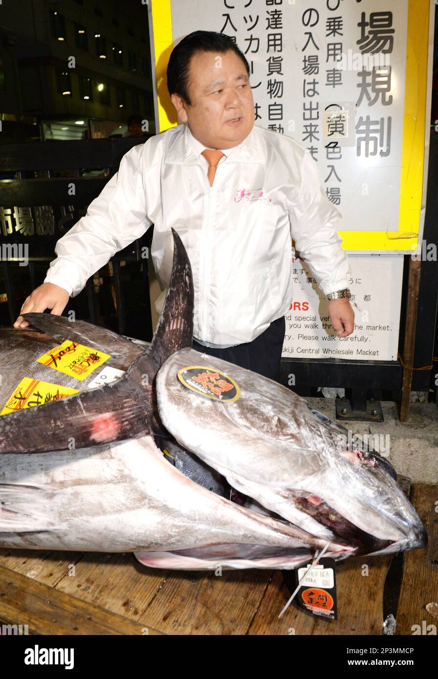 Kiyoshi Kimura, president of Kiyomura Co. a sushi operator, poses with