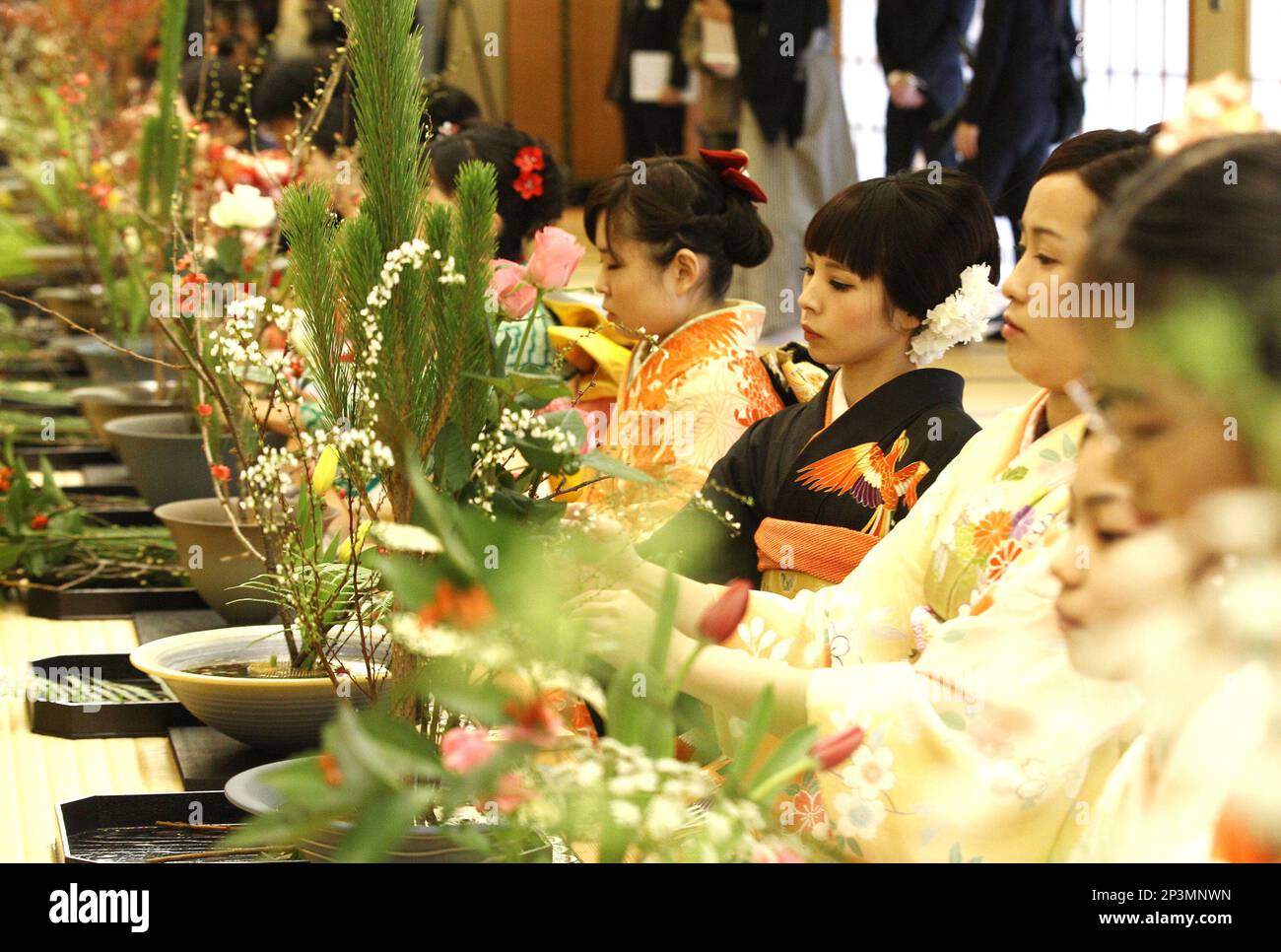 Kimono-clad students of the Ikenobo school of Japanese flower 