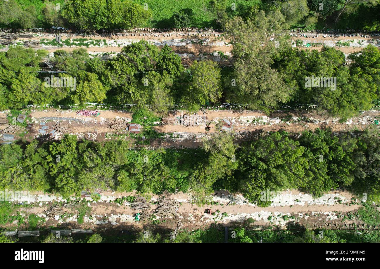 Ruins of destroyed factory above top drone view. Leftover of building plant structure Stock Photo