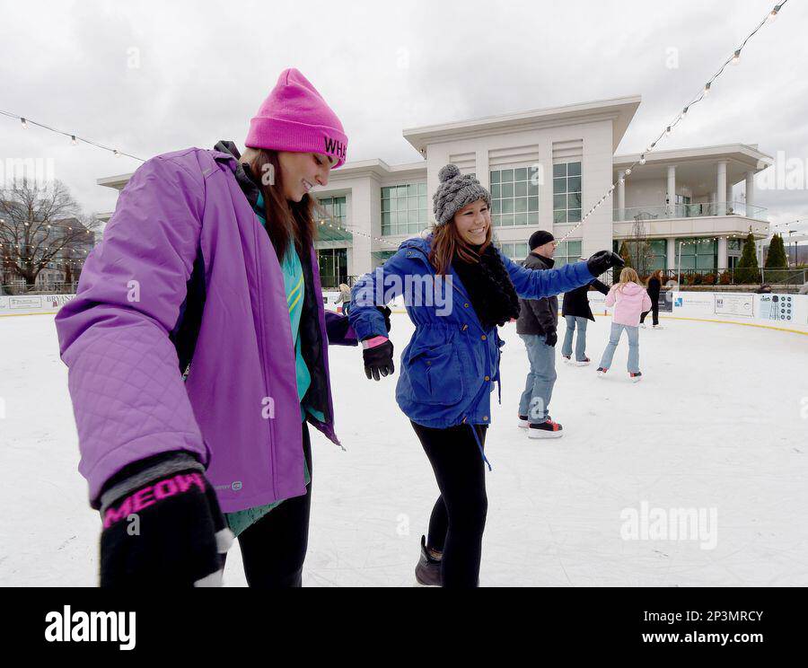 Keela Davis , 16, and Brandy Hamm, 20, both of Tuscumbia, ice skate for