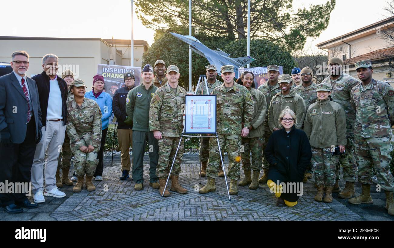 Members of the 31st Fighter Wing gather to commemorate the beginning of Black History Month during the BHM proclamation signing ceremony at Aviano Air Base, Italy, Feb. 1, 2023. BHM recognition was extended from a week to a month by U.S. president Gerald Ford in 1976 to honor the accomplishments of Black Americans throughout history. Stock Photo