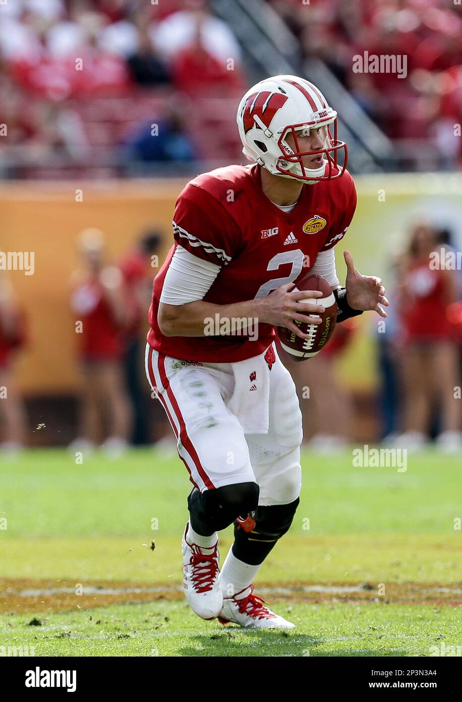 Wisconsin Badgers quarterback Joel Stave (2) looks downfield for a ...