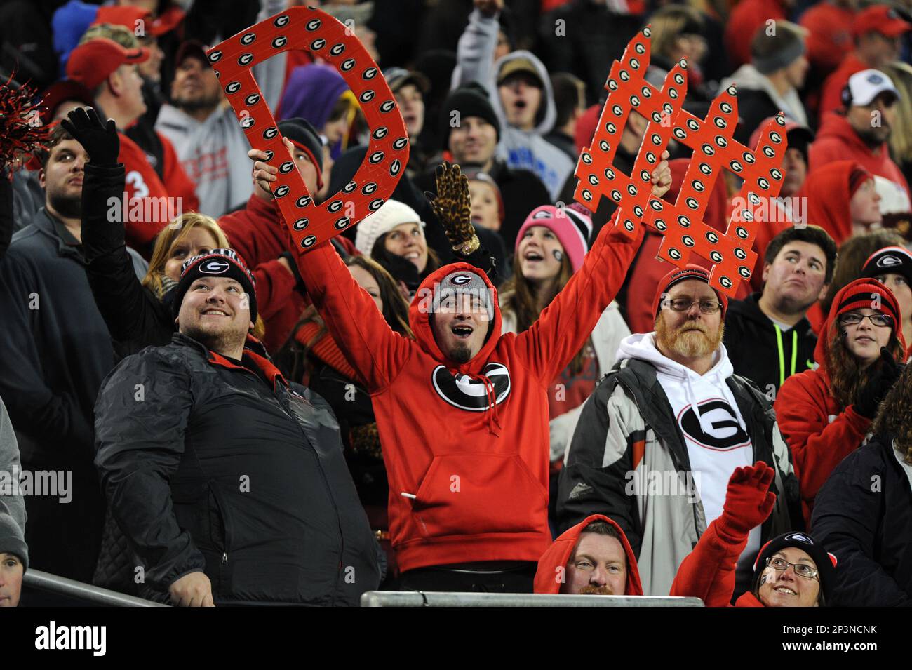 December 30 2014: A Georgia Bulldogs fan cheers on the defense in the ...
