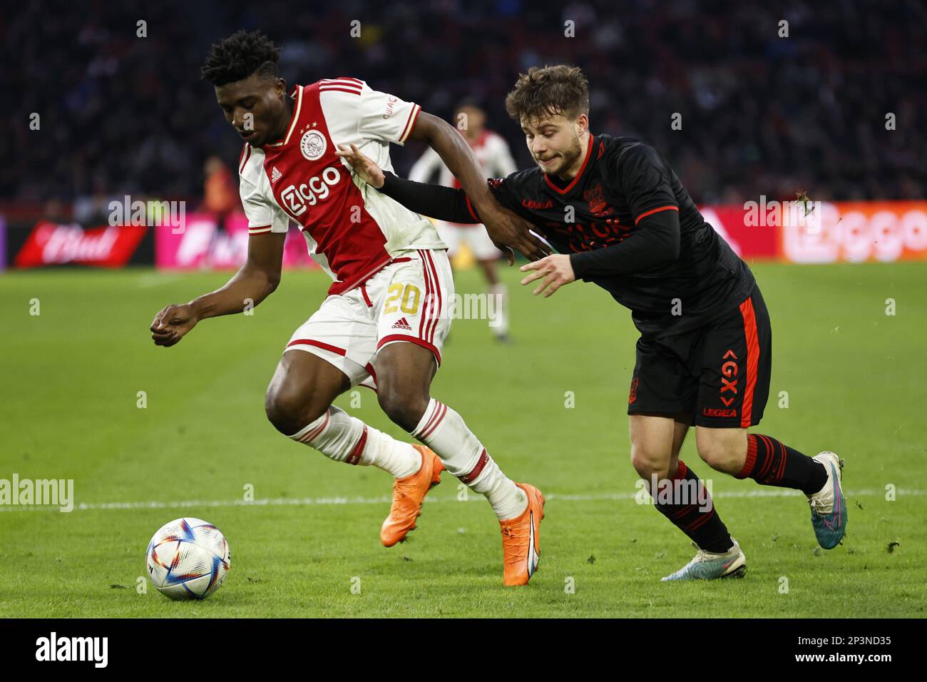 AMSTERDAM (lr) Mohammed Kudus of Ajax, Dirk Proper of NEC Nijmegen during the Dutch premier