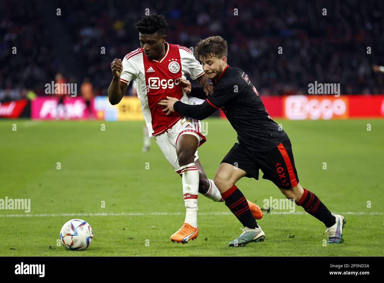 AMSTERDAM (lr) Mohammed Kudus of Ajax, Dirk Proper of NEC Nijmegen during the Dutch premier