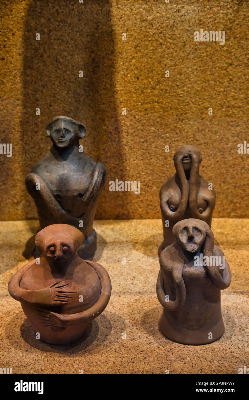 Small statues from a votive deposit handmolded figurines indicate