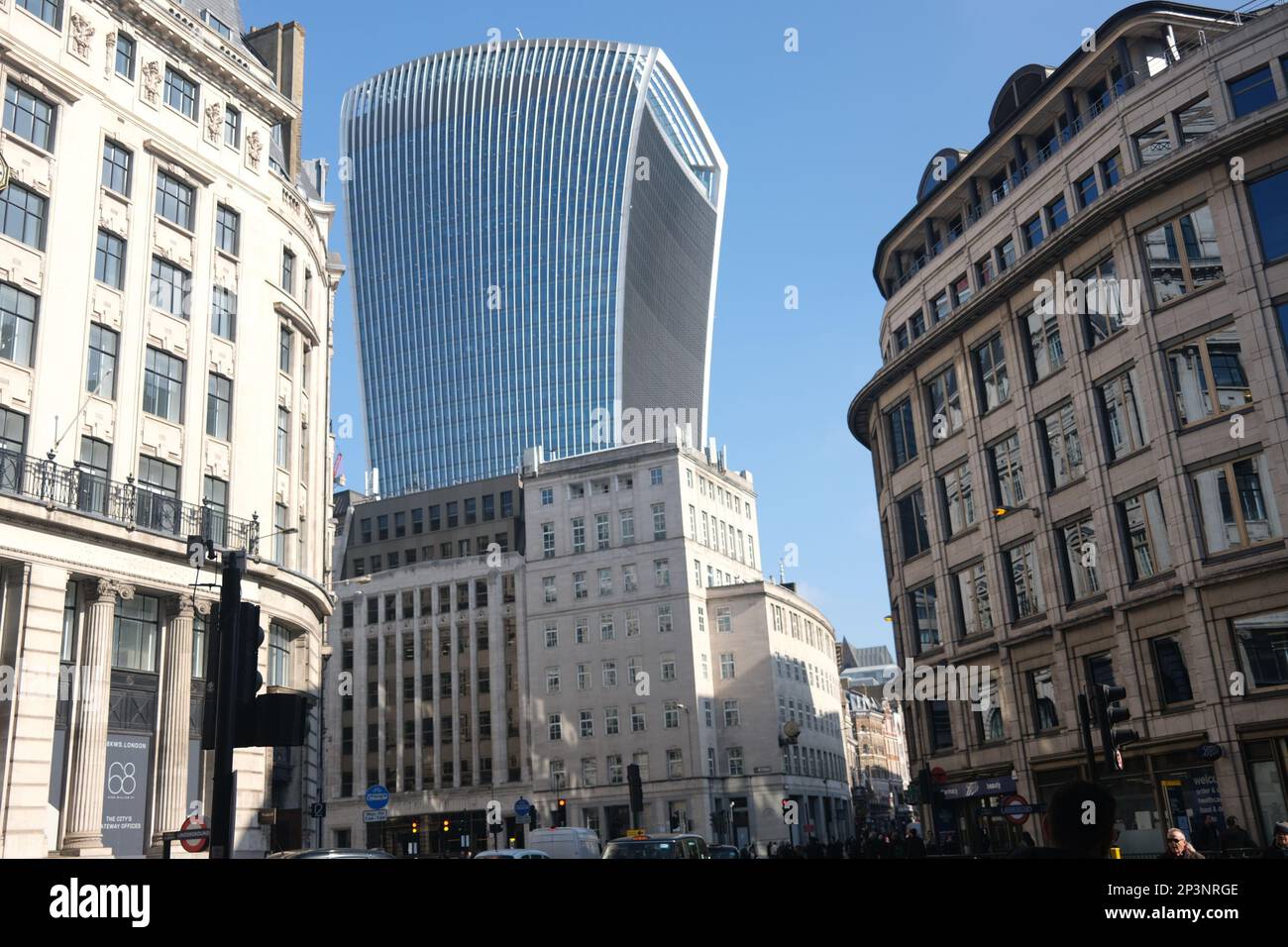 Central London on a sunny spring day in March 2023. The area features a blend of various architectural styles with the walkie talkie looming large Stock Photo