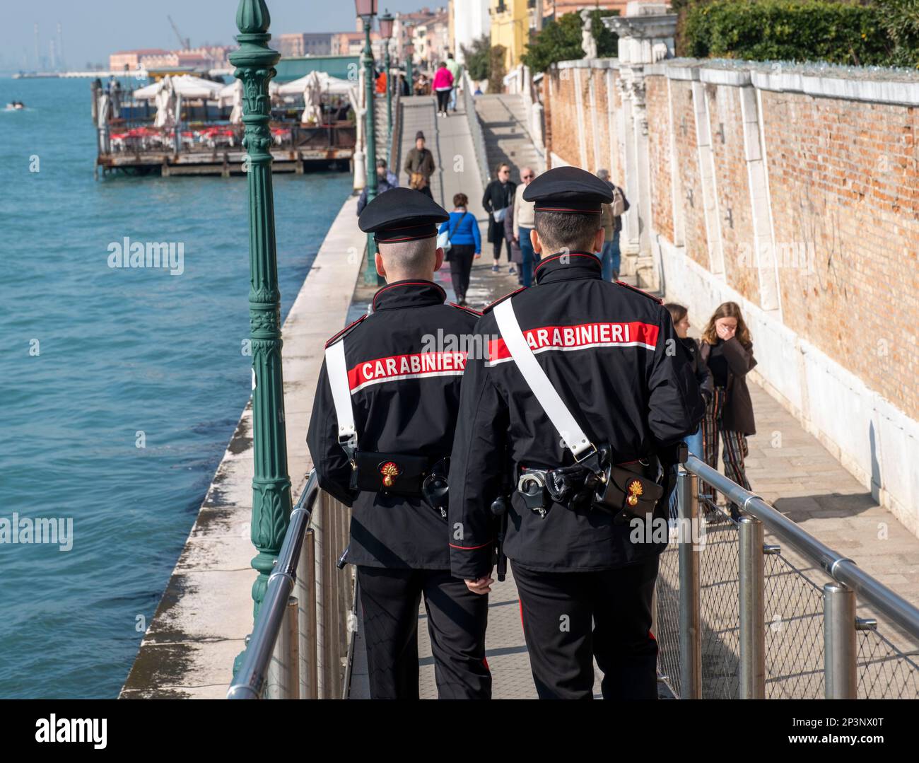 Carabinieri on patrol the embankment of the Fondamenta Zattere Al Gesuiti, Venice, Italy. Stock Photo