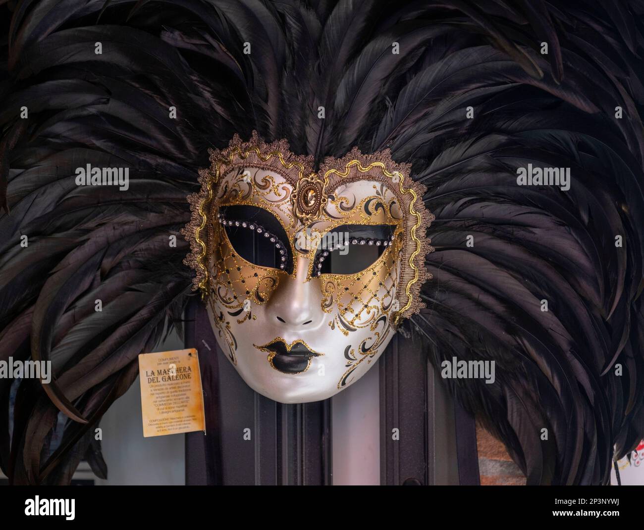 Face mask on display on a street venders stall, Venice, Italy. Stock Photo