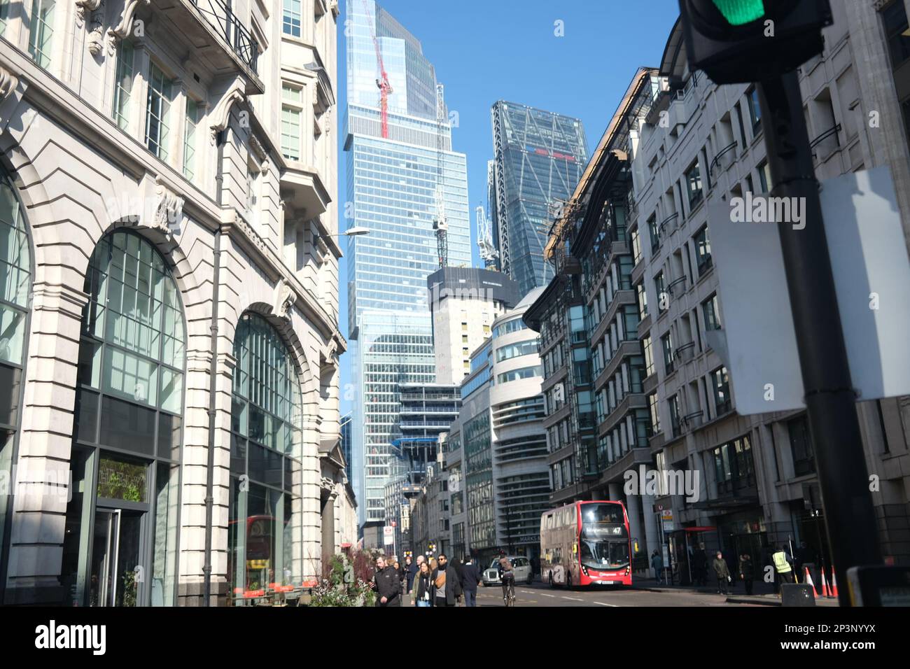 A street scene in central London on a sunny early spring day in March. Noteworthy architecture abounds in a blend of old and new Stock Photo