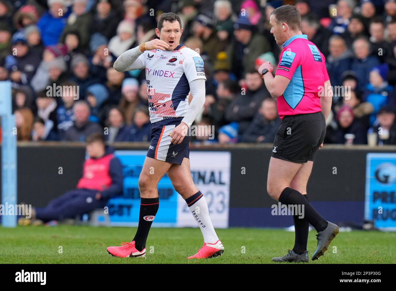 Referee Tom Foley speaks with Alex Goode #15 of captain of Saracens before sending off Robin Hislop #17 of Saracens during the Gallagher Premiership match Sale Sharks vs Saracens at AJ Bell Stadium, Eccles, United Kingdom, 5th March 2023  (Photo by Steve Flynn/News Images) Stock Photo