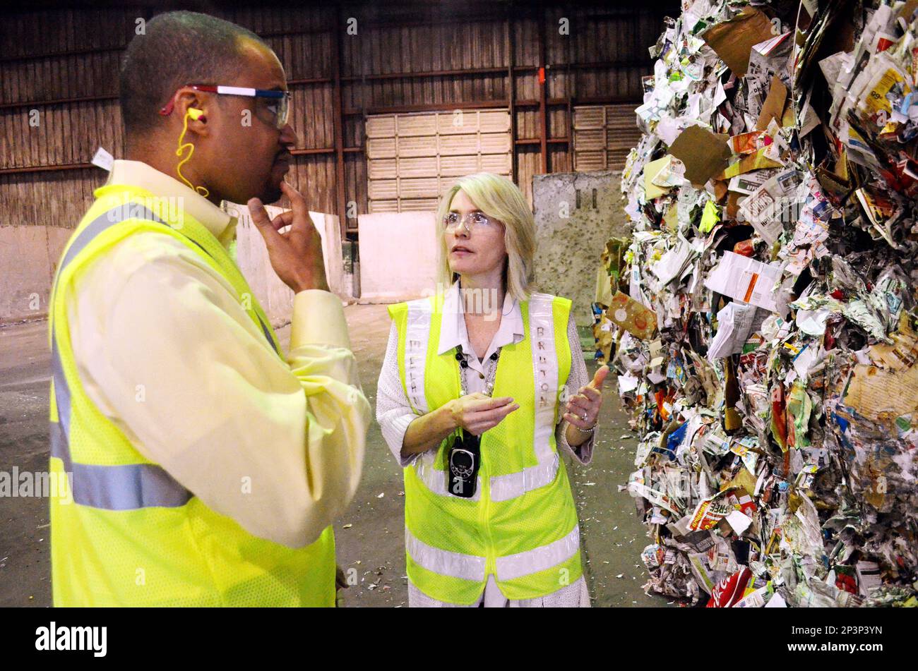 Communication Officer Jeron Hollis, left, talks about the benefits of