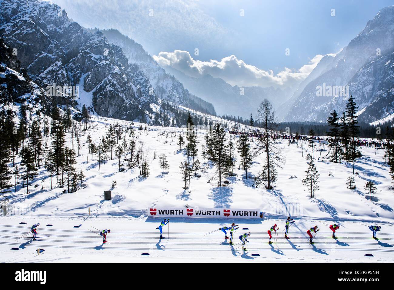 Planica, Slovenia. 5 March, 2023. Cross country skiers glide downhil  in the men’s 50-kilometer classic race at the 2023 FIS World Nordic Ski Championships in Planica, Slovenia., won by Norwegian Paal Golberg. Credit: John Lazenby/Alamy Live News Stock Photo