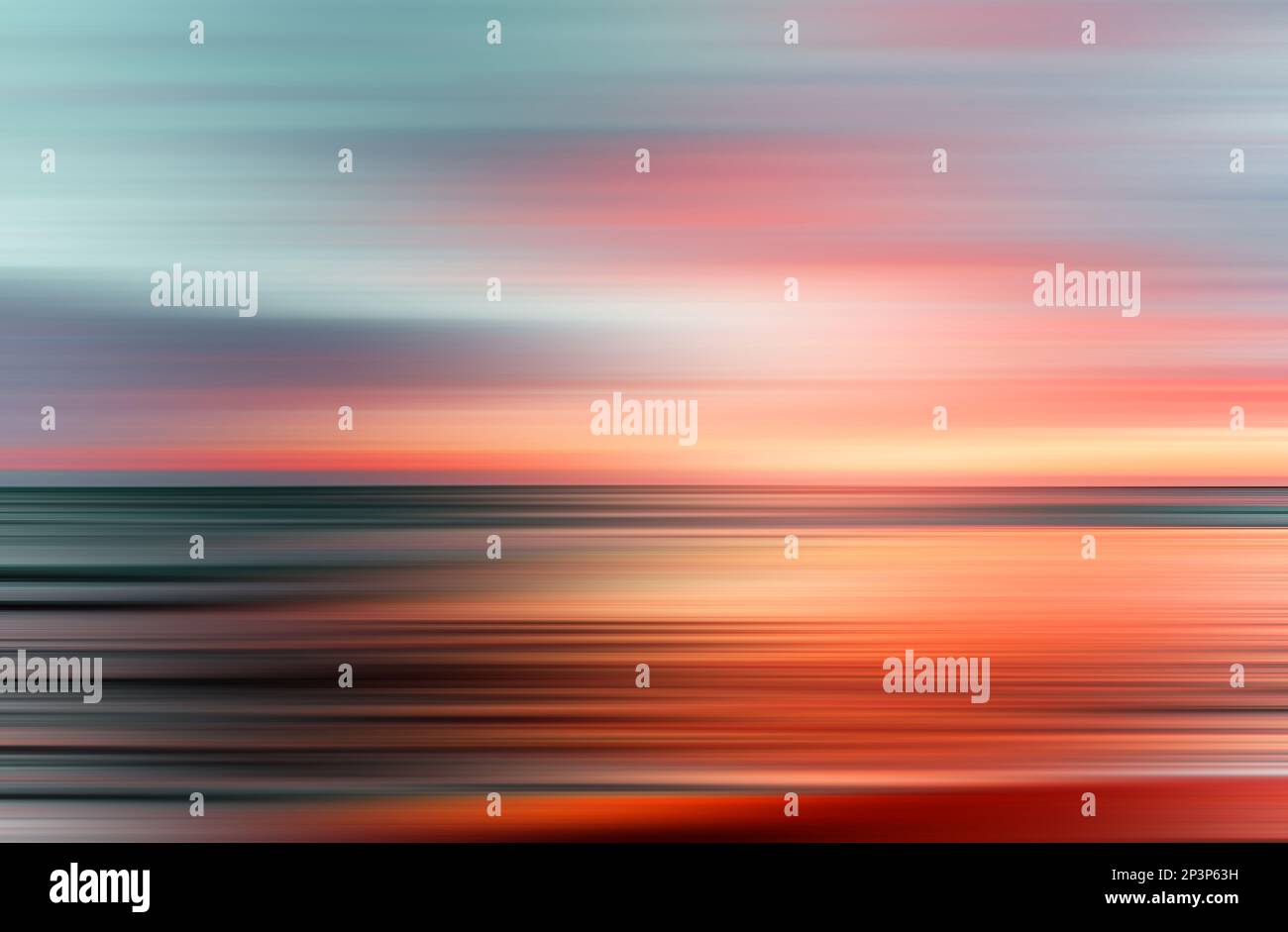 sunset colors on ocean horizon, motion blur Stock Photo