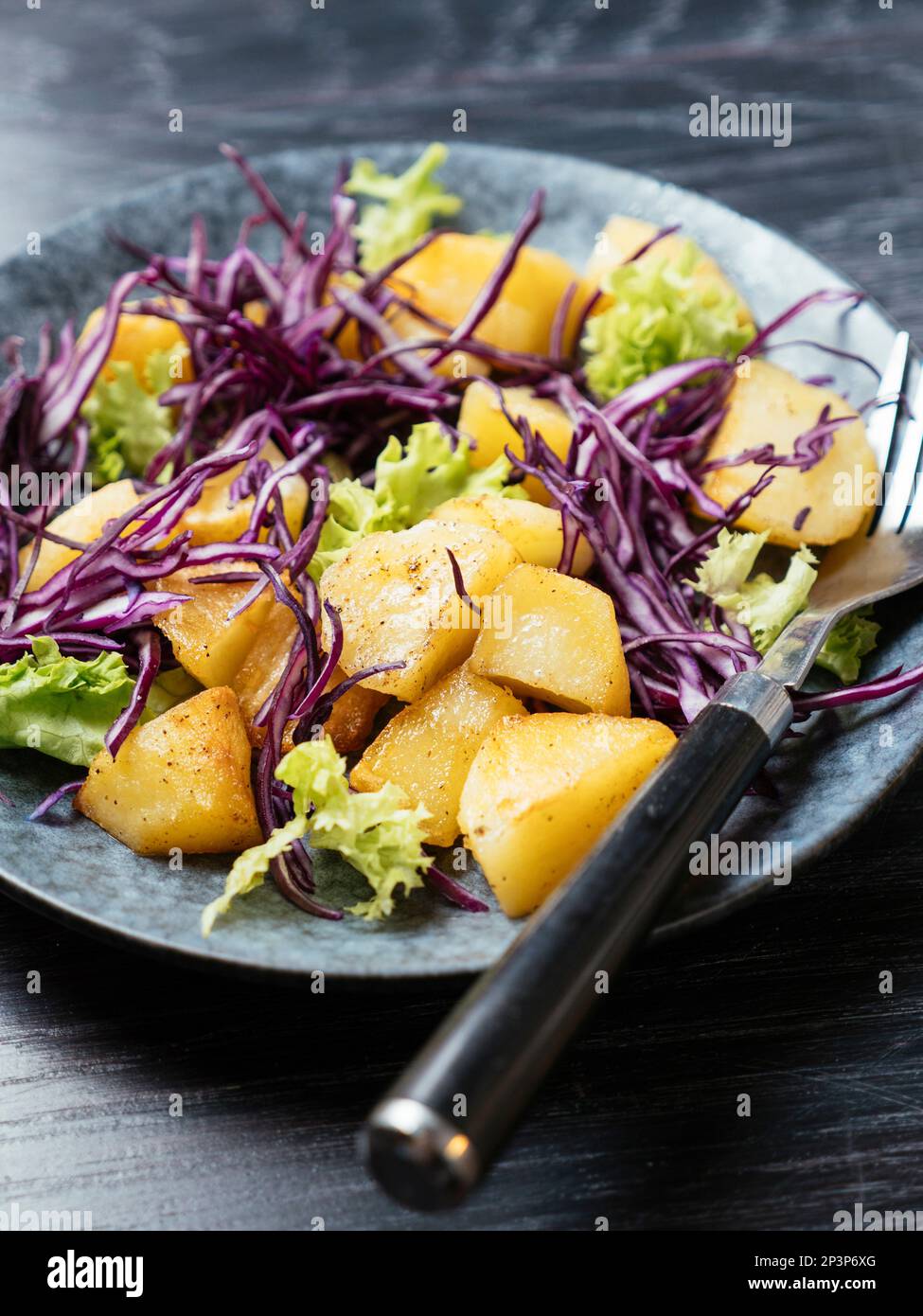 Warm Potato Salad with Red Cabbage Stock Photo