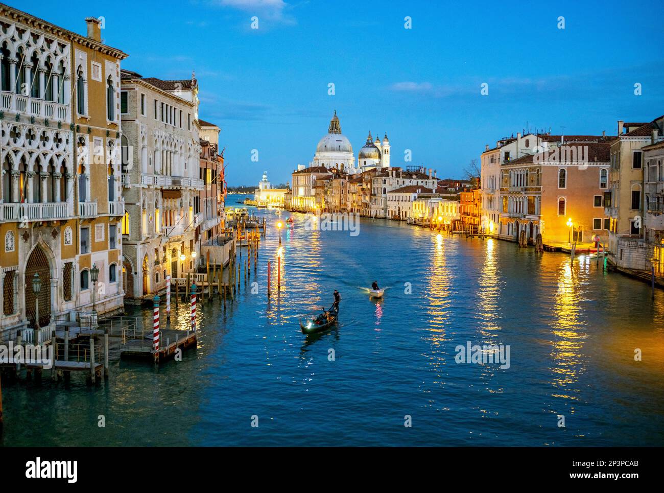 The Grand Canal and Basilica di Santa Maria della Salute after sunset ...