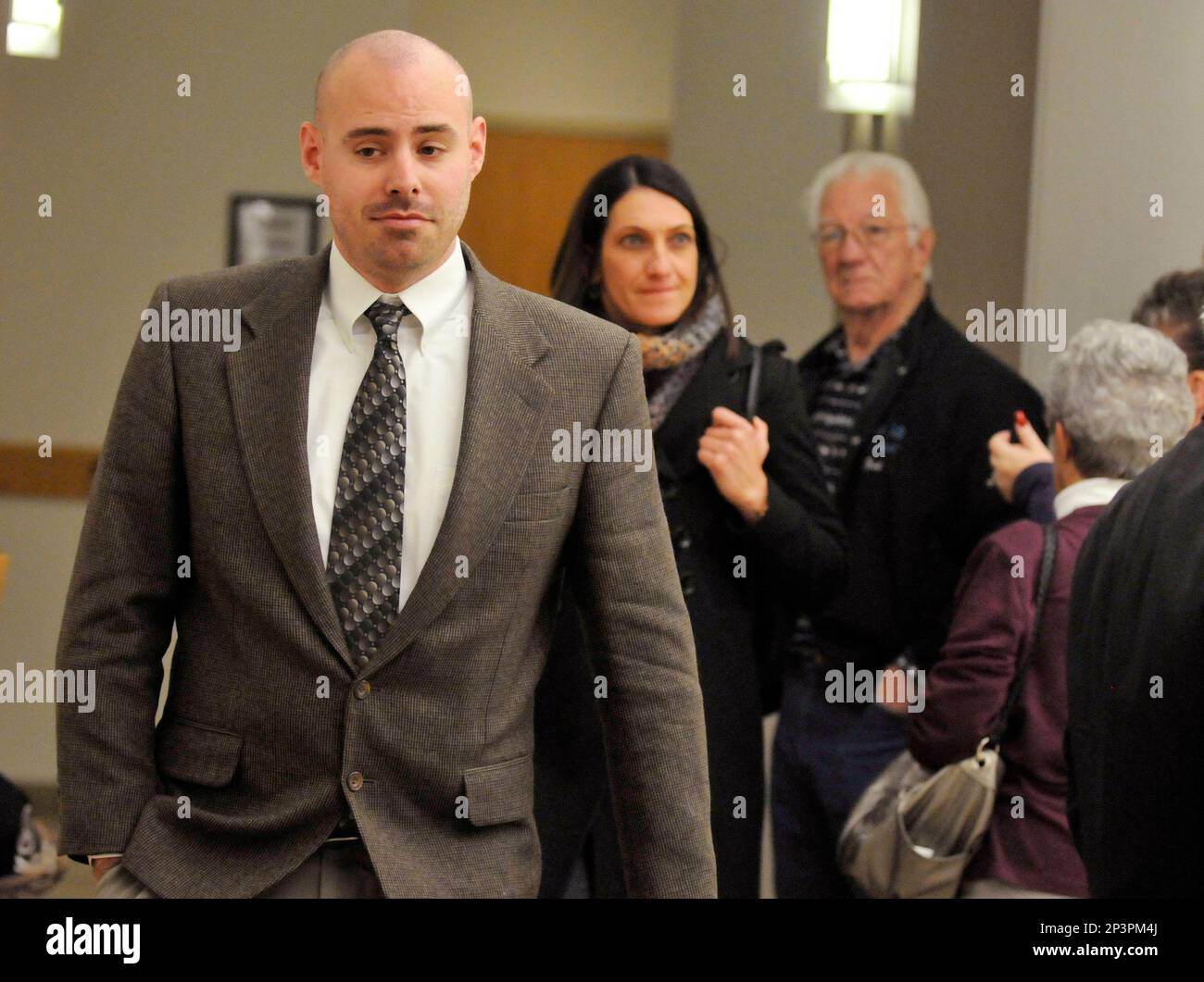 Tom Fallis, a former Weld County sheriff's deputy, leaves the courtroom