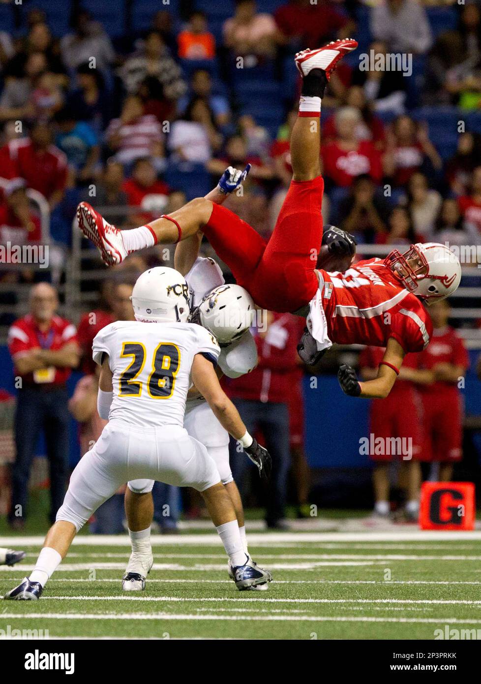 Cypress Ranch outside linebacker Bryce Saracene flips over