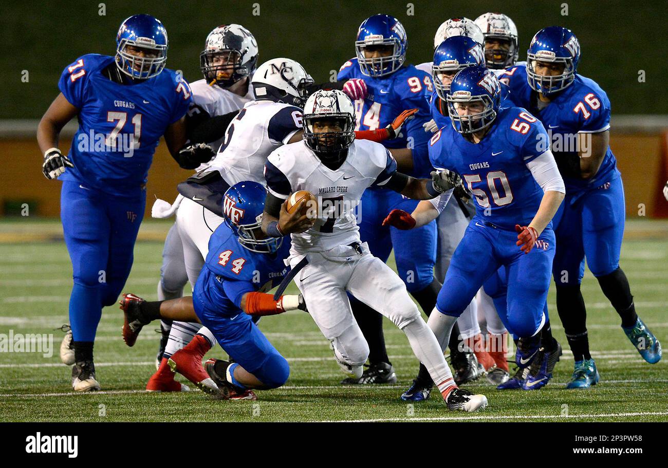High school football team in action during the year how long is a high school football game quarter