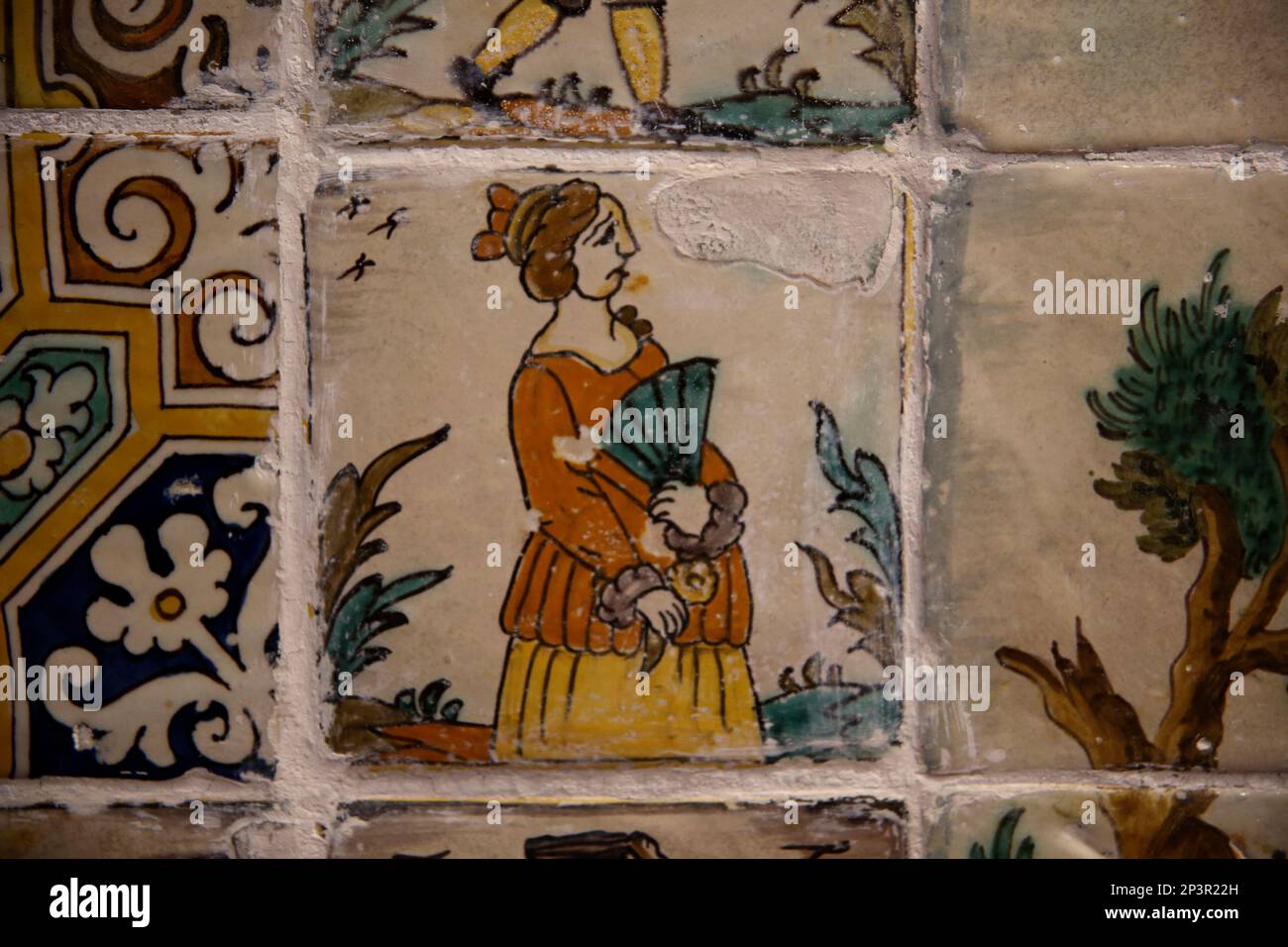 Catalan tiles trade. 19th century.  Popular character 'gegantina'. Kitchen. Monastery of Pedralbes. Barcelona. Catalonia. Spain. Stock Photo