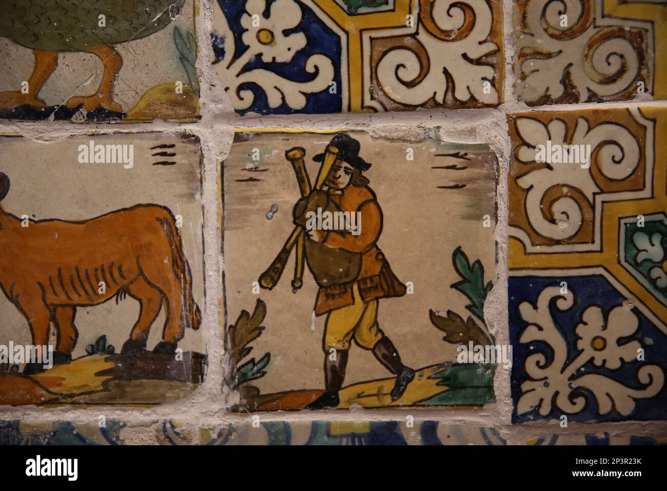 Catalan tiles trade. 19th century.  Bagpiper. Kitchen. Monastery of Pedralbes. Barcelona. Catalonia. Spain. Stock Photo