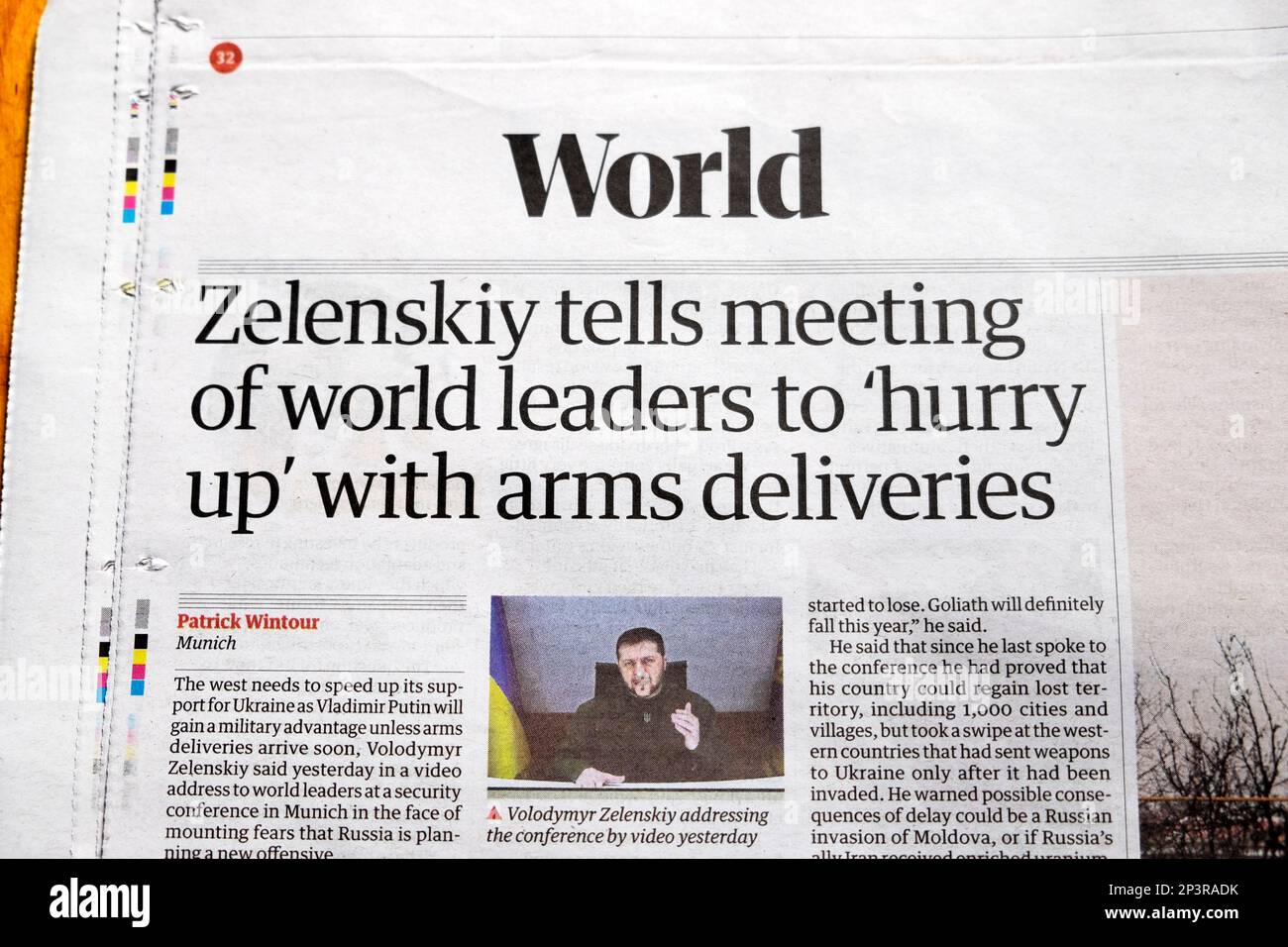 'Zelenskiy tells meeting of world leaders to 'hurry up' with arms deliveries' Guardian newspaper headline Ukraine war arms weapons delivery 2023 UK Stock Photo