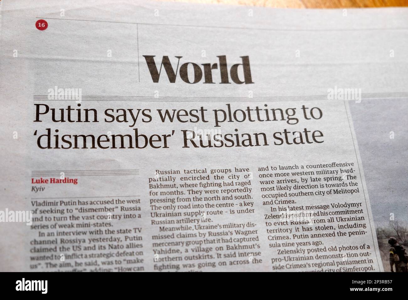 Guardian newspaper headline article Vladimir 'Putin says west plotting to 'dismember' Russian state' 26 February 2023 London UK Stock Photo