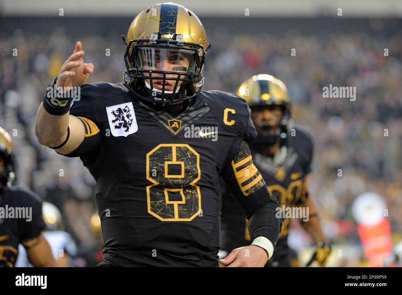 8 December 2012: Army Black Knights quarterback Trent Steelman (8) salutes  after running for a touchdown against the Navy Midshipmen at Lincoln  Financial field in Philadelphia, PA. in the 113th annual Army