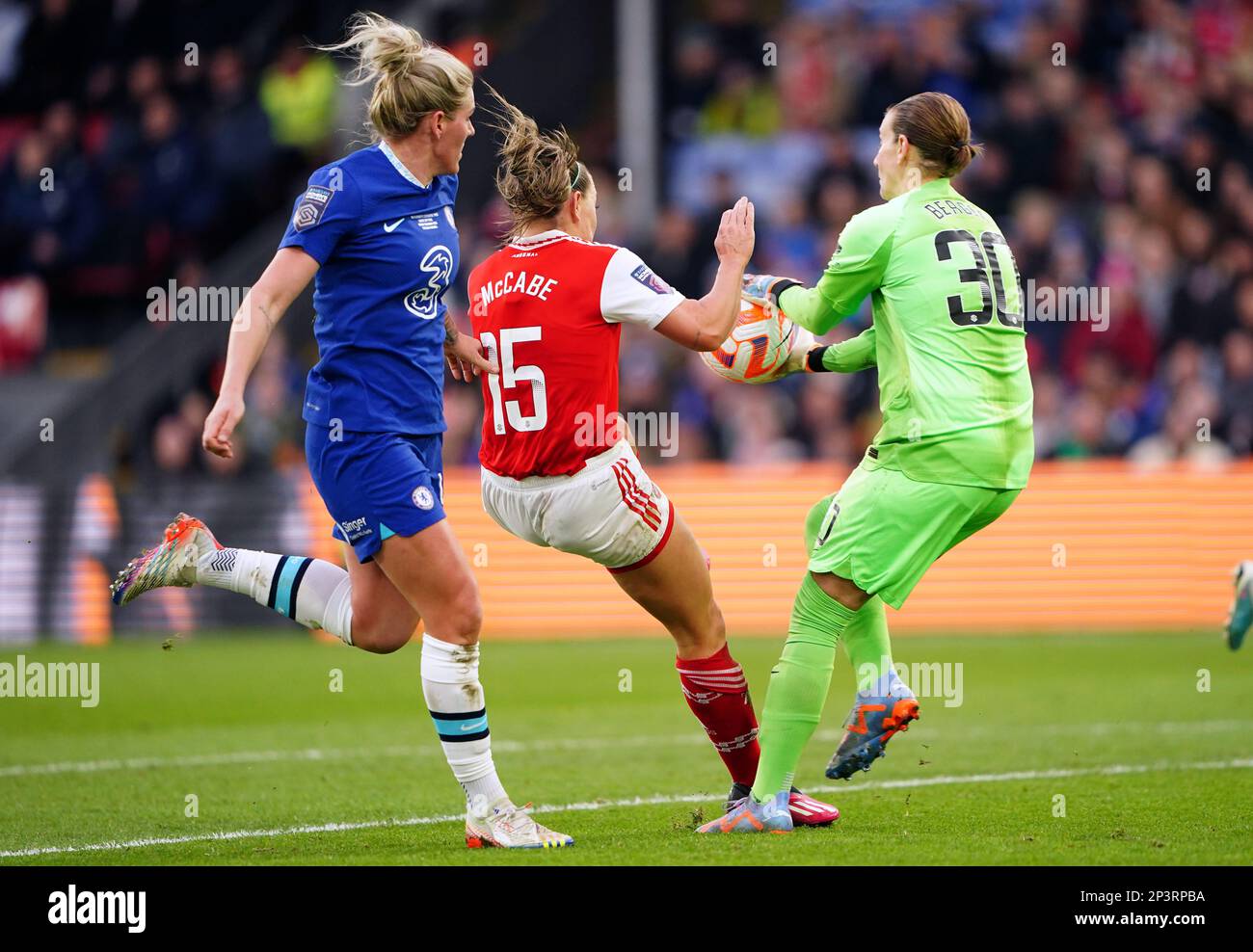 Arsenal's Katie McCabe is tackled by Chelsea goalkeeper Ann-Katrin Berger during The FA Women's Continental Tyres League Cup final match at Selhurst Park, London. Picture date: Sunday March 5, 2023. Stock Photo