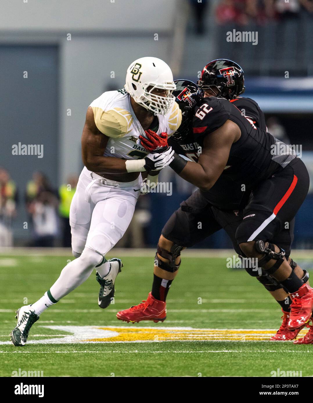 November 29, 2104: Baylor Bears defensive end Shawn Oakman (2) battles ...