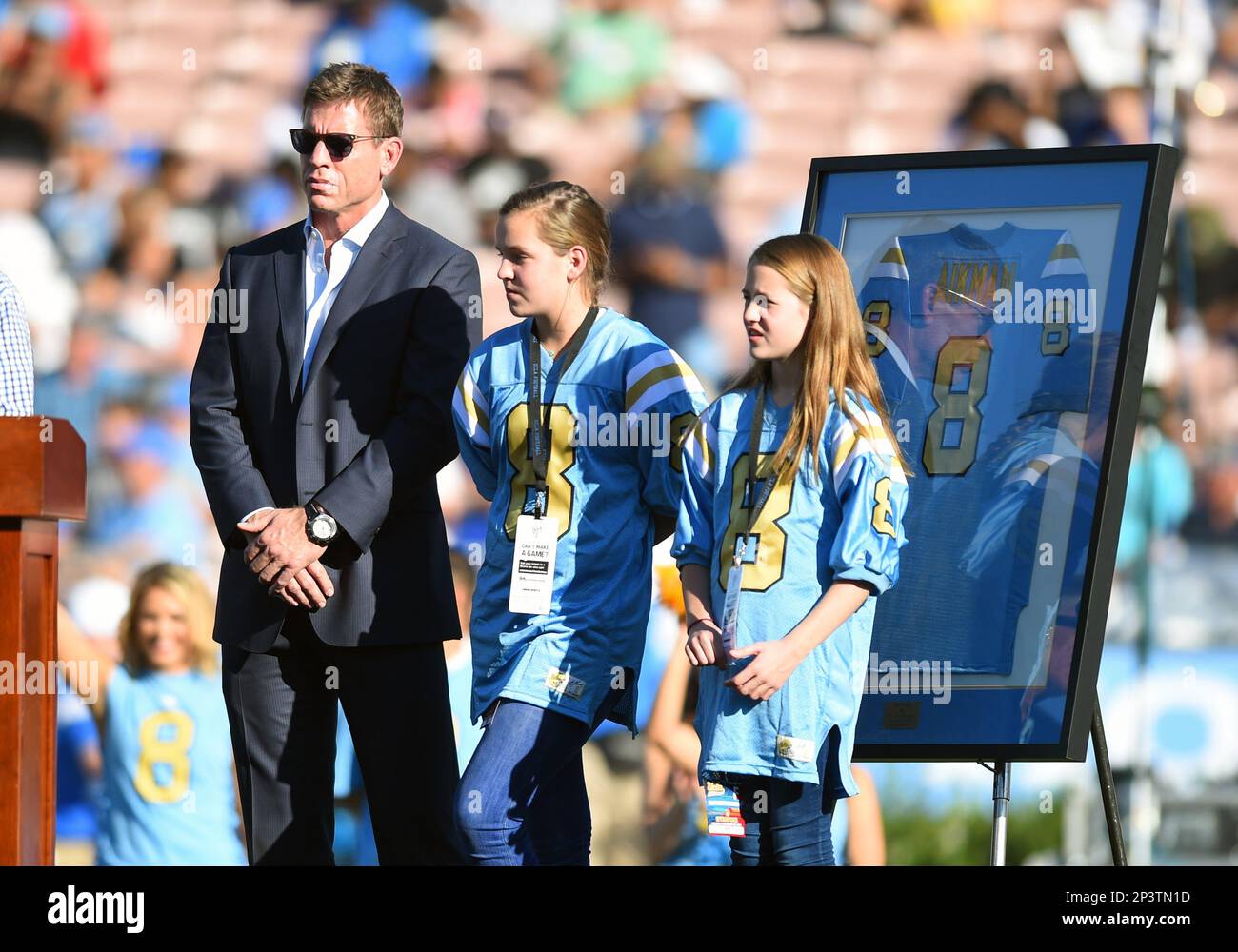 28 November 2014: NFL Hall of Famer Troy Aikman and his daughters during  the ceremony to retire his #8 UCLA jersey during an NCAA football game  between the Stanford Cardinal and the