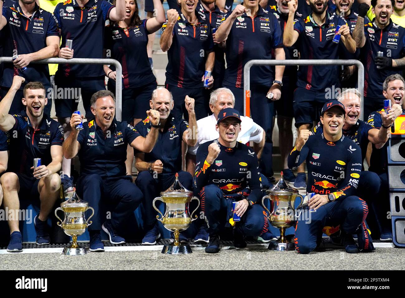 Race winner Red Bull's Max Verstappen (centre) and second place Red Bull's Sergio Perez celebrates with team after the the Bahrain Grand Prix at the Bahrain International Circuit, Sakhir. Picture date: Sunday March 5, 2023. Stock Photo