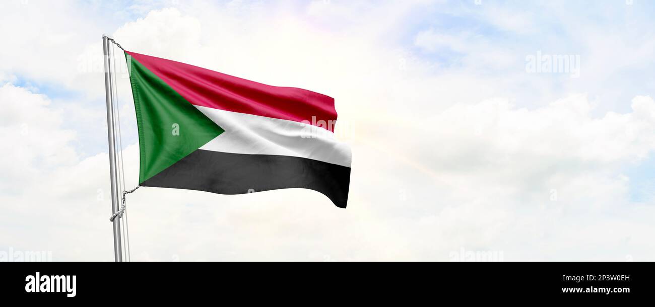 Sudan flag waving on sky background. 3D Rendering Stock Photo - Alamy